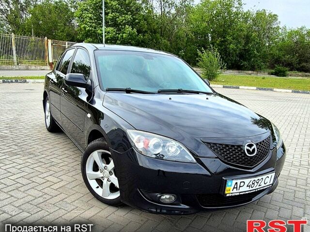 Черный Мазда 3, объемом двигателя 1.6 л и пробегом 357 тыс. км за 5200 $, фото 1 на Automoto.ua