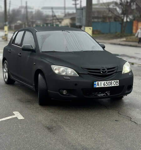 Черный Мазда 3, объемом двигателя 2 л и пробегом 350 тыс. км за 3000 $, фото 1 на Automoto.ua