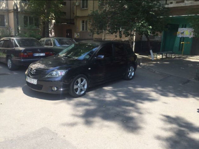Черный Мазда 3, объемом двигателя 2.3 л и пробегом 145 тыс. км за 7000 $, фото 1 на Automoto.ua