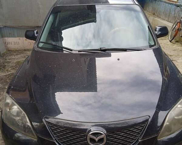Чорний Мазда 3, об'ємом двигуна 2 л та пробігом 200 тис. км за 4700 $, фото 1 на Automoto.ua