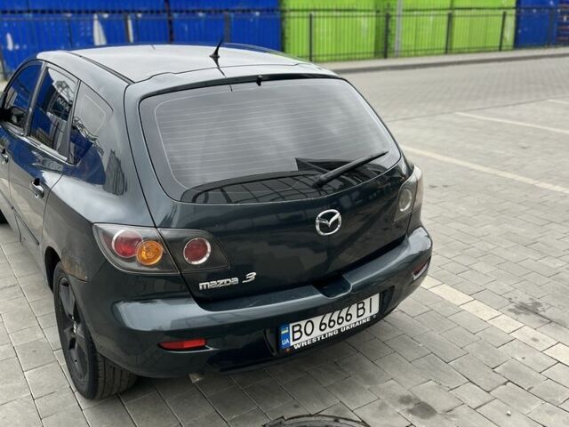 Черный Мазда 3, объемом двигателя 1.6 л и пробегом 348 тыс. км за 2750 $, фото 1 на Automoto.ua