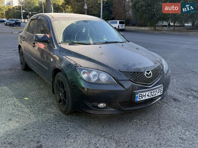 Чорний Мазда 3, об'ємом двигуна 2 л та пробігом 173 тис. км за 2999 $, фото 1 на Automoto.ua