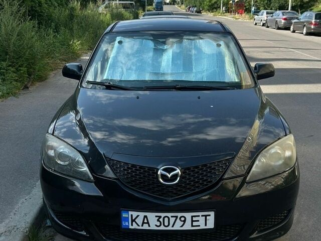 Чорний Мазда 3, об'ємом двигуна 1.6 л та пробігом 259 тис. км за 3650 $, фото 1 на Automoto.ua