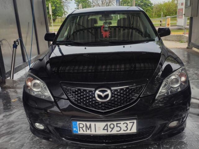 Чорний Мазда 3, об'ємом двигуна 0 л та пробігом 321 тис. км за 2108 $, фото 1 на Automoto.ua
