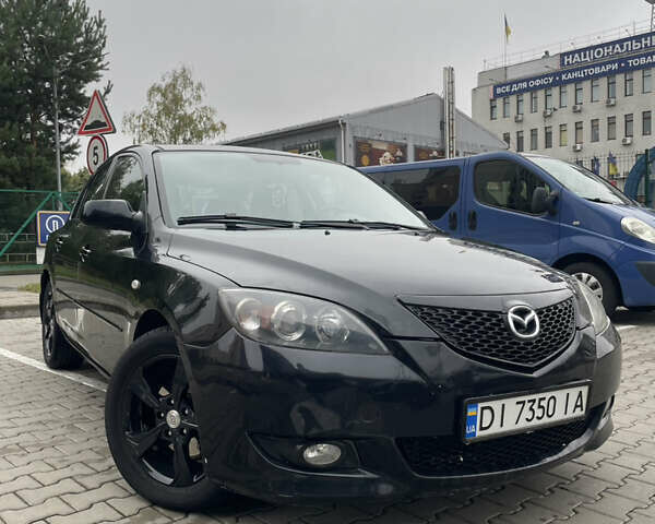 Черный Мазда 3, объемом двигателя 1.6 л и пробегом 146 тыс. км за 5499 $, фото 1 на Automoto.ua