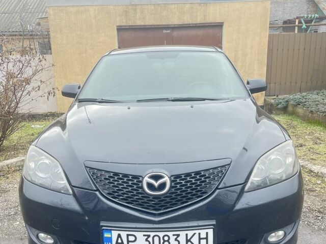 Черный Мазда 3, объемом двигателя 2 л и пробегом 245 тыс. км за 4650 $, фото 1 на Automoto.ua