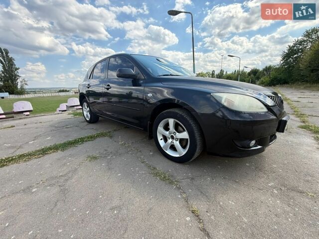 Черный Мазда 3, объемом двигателя 1.6 л и пробегом 289 тыс. км за 3900 $, фото 1 на Automoto.ua