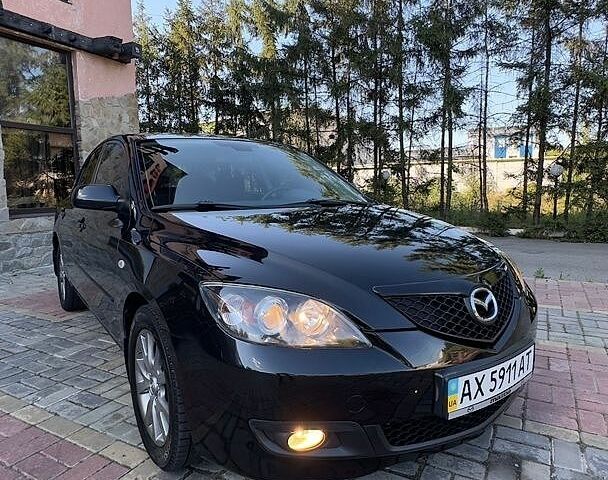 Черный Мазда 3, объемом двигателя 1.6 л и пробегом 158 тыс. км за 5750 $, фото 1 на Automoto.ua