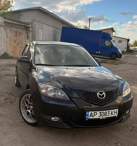 Черный Мазда 3, объемом двигателя 2 л и пробегом 338 тыс. км за 5500 $, фото 1 на Automoto.ua