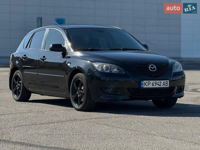Черный Мазда 3, объемом двигателя 1.6 л и пробегом 192 тыс. км за 5300 $, фото 1 на Automoto.ua