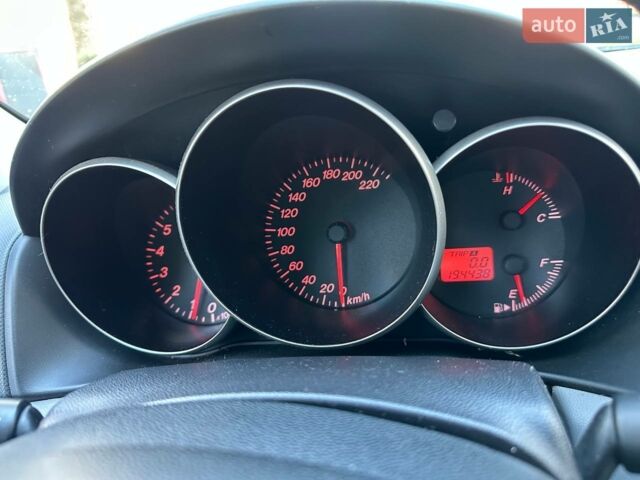 Черный Мазда 3, объемом двигателя 1.3 л и пробегом 194 тыс. км за 4290 $, фото 1 на Automoto.ua