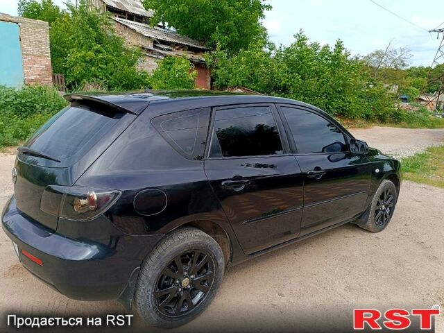 Черный Мазда 3, объемом двигателя 1.6 л и пробегом 155 тыс. км за 5200 $, фото 1 на Automoto.ua