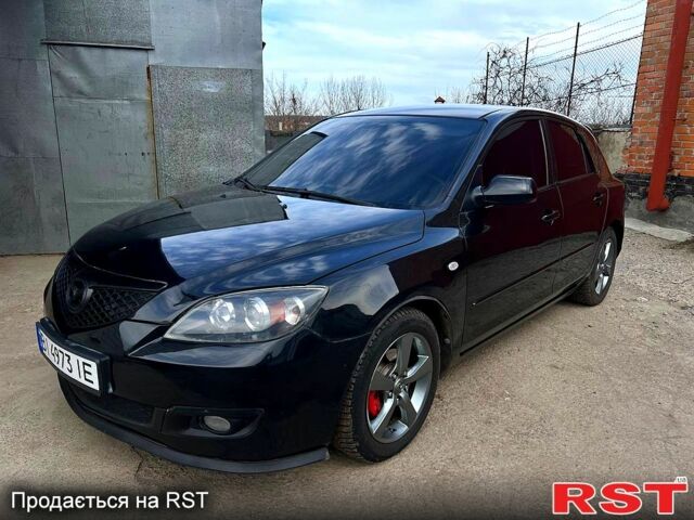 Черный Мазда 3, объемом двигателя 1.6 л и пробегом 333 тыс. км за 4600 $, фото 1 на Automoto.ua