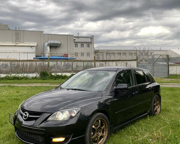 Черный Мазда 3, объемом двигателя 2.26 л и пробегом 353 тыс. км за 7000 $, фото 1 на Automoto.ua