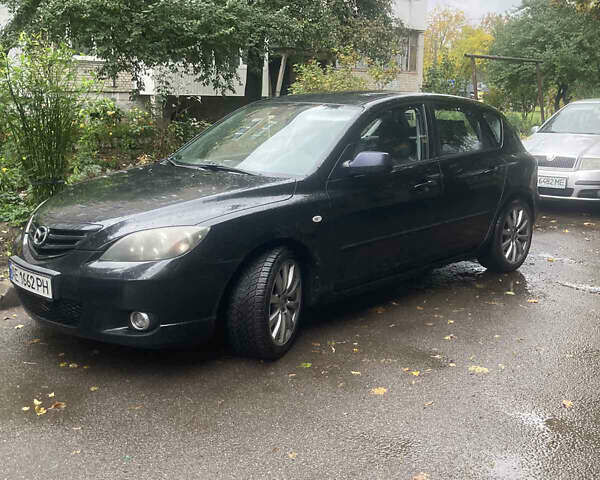 Черный Мазда 3, объемом двигателя 1.6 л и пробегом 185 тыс. км за 5300 $, фото 1 на Automoto.ua