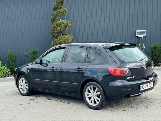 Черный Мазда 3, объемом двигателя 1.6 л и пробегом 303 тыс. км за 4400 $, фото 1 на Automoto.ua