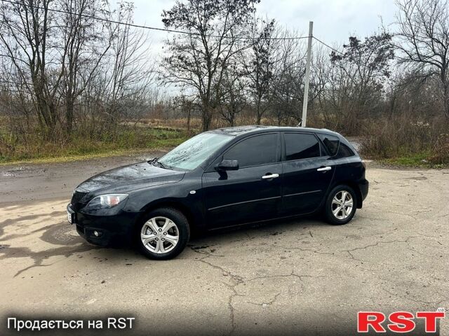 Черный Мазда 3, объемом двигателя 1.6 л и пробегом 212 тыс. км за 5500 $, фото 1 на Automoto.ua