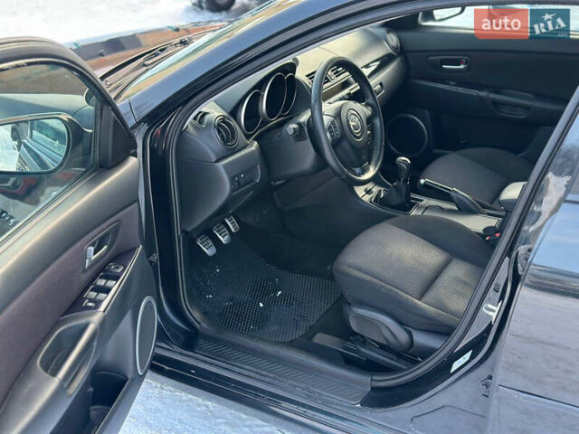 Черный Мазда 3, объемом двигателя 2 л и пробегом 300 тыс. км за 4850 $, фото 1 на Automoto.ua