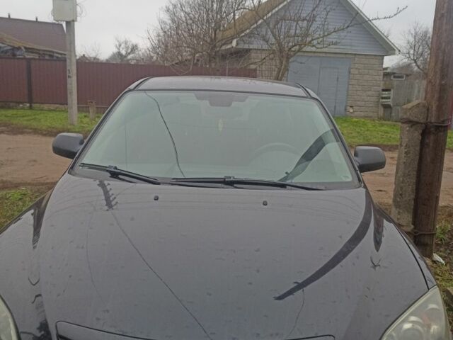 Черный Мазда 3, объемом двигателя 2 л и пробегом 175 тыс. км за 5500 $, фото 1 на Automoto.ua