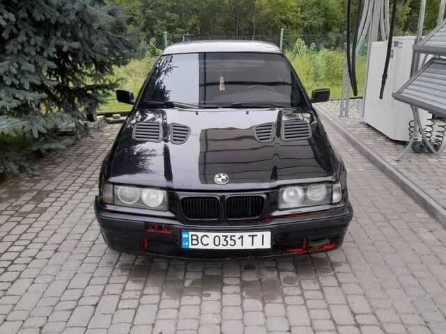 Чорний Мазда 3, об'ємом двигуна 1.6 л та пробігом 146 тис. км за 6550 $, фото 1 на Automoto.ua