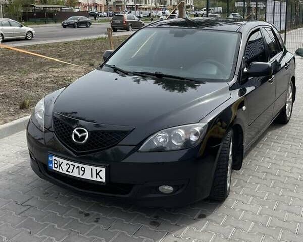 Черный Мазда 3, объемом двигателя 1.6 л и пробегом 264 тыс. км за 4950 $, фото 1 на Automoto.ua