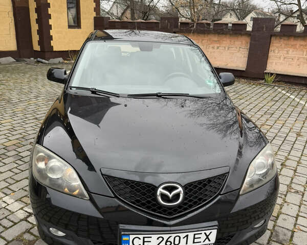 Черный Мазда 3, объемом двигателя 1.6 л и пробегом 217 тыс. км за 5800 $, фото 1 на Automoto.ua