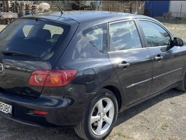 Черный Мазда 3, объемом двигателя 0 л и пробегом 320 тыс. км за 1900 $, фото 1 на Automoto.ua