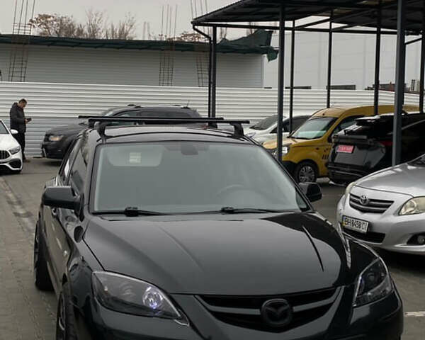 Черный Мазда 3, объемом двигателя 2.3 л и пробегом 140 тыс. км за 8500 $, фото 1 на Automoto.ua