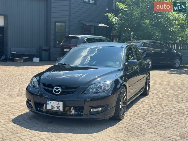 Черный Мазда 3, объемом двигателя 2.3 л и пробегом 150 тыс. км за 15000 $, фото 1 на Automoto.ua