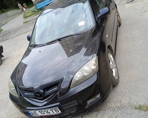Черный Мазда 3, объемом двигателя 2 л и пробегом 140 тыс. км за 7000 $, фото 1 на Automoto.ua