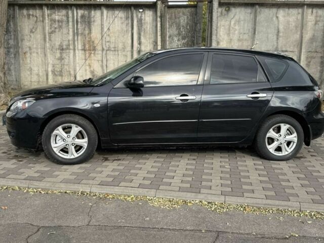 Черный Мазда 3, объемом двигателя 1.6 л и пробегом 215 тыс. км за 5850 $, фото 1 на Automoto.ua