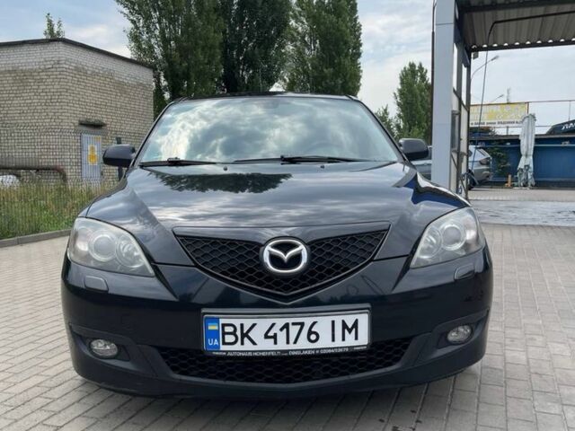 Черный Мазда 3, объемом двигателя 1.6 л и пробегом 180 тыс. км за 6198 $, фото 1 на Automoto.ua