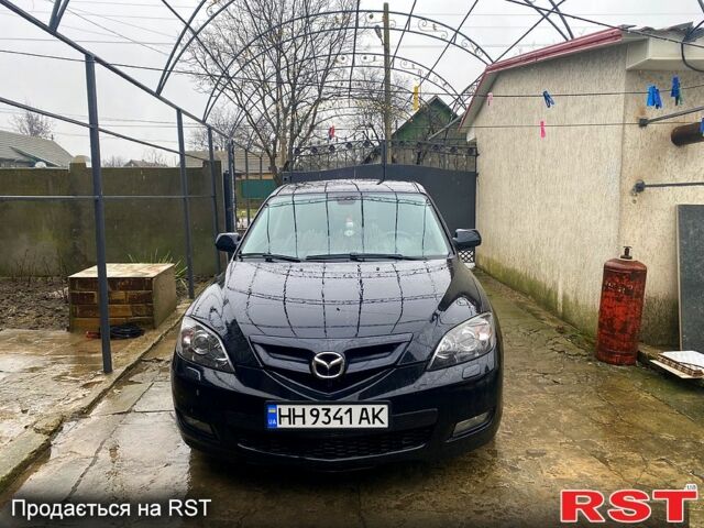 Черный Мазда 3, объемом двигателя 2 л и пробегом 21100 тыс. км за 6000 $, фото 1 на Automoto.ua