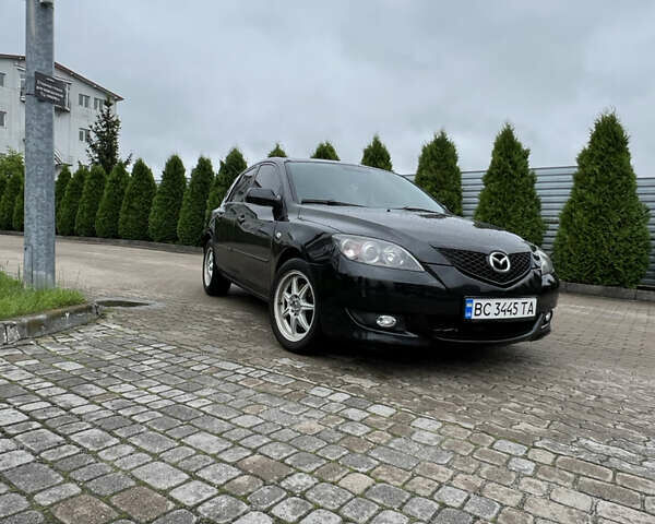 Черный Мазда 3, объемом двигателя 1.6 л и пробегом 235 тыс. км за 5200 $, фото 1 на Automoto.ua