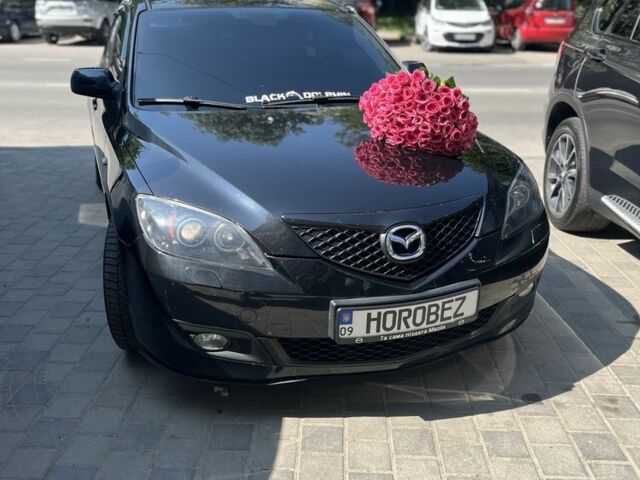 Черный Мазда 3, объемом двигателя 1.6 л и пробегом 345 тыс. км за 5650 $, фото 1 на Automoto.ua