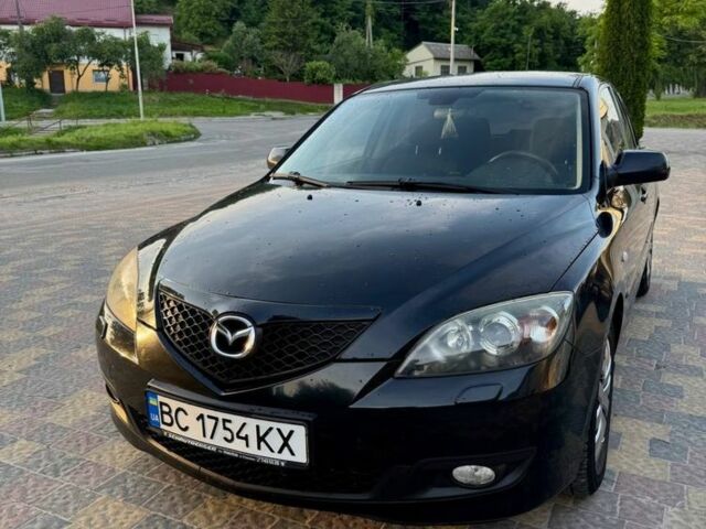Черный Мазда 3, объемом двигателя 1.6 л и пробегом 240 тыс. км за 5300 $, фото 1 на Automoto.ua