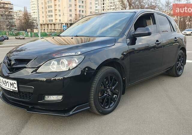 Черный Мазда 3, объемом двигателя 2 л и пробегом 250 тыс. км за 4900 $, фото 1 на Automoto.ua