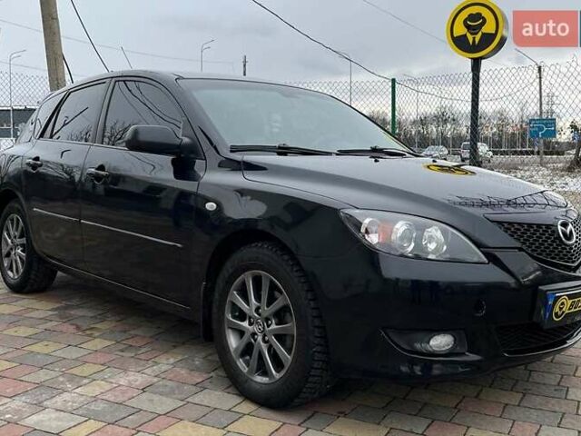 Черный Мазда 3, объемом двигателя 1.6 л и пробегом 265 тыс. км за 5999 $, фото 1 на Automoto.ua