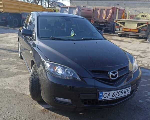 Черный Мазда 3, объемом двигателя 2 л и пробегом 160 тыс. км за 5800 $, фото 1 на Automoto.ua