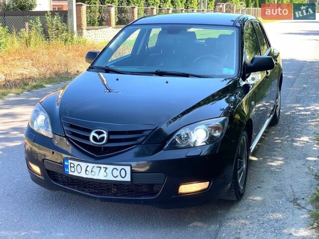 Черный Мазда 3, объемом двигателя 1.56 л и пробегом 190 тыс. км за 6500 $, фото 1 на Automoto.ua