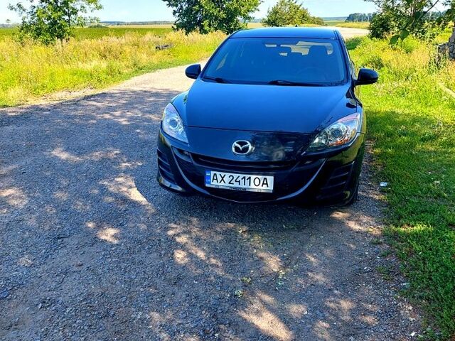 Черный Мазда 3, объемом двигателя 1.6 л и пробегом 299 тыс. км за 6800 $, фото 1 на Automoto.ua