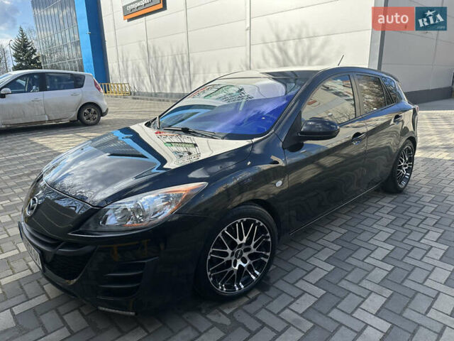 Черный Мазда 3, объемом двигателя 1.6 л и пробегом 214 тыс. км за 6500 $, фото 1 на Automoto.ua