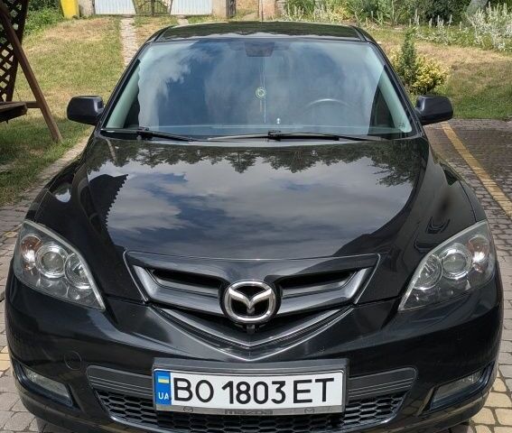 Чорний Мазда 3, об'ємом двигуна 1.6 л та пробігом 249 тис. км за 4800 $, фото 1 на Automoto.ua