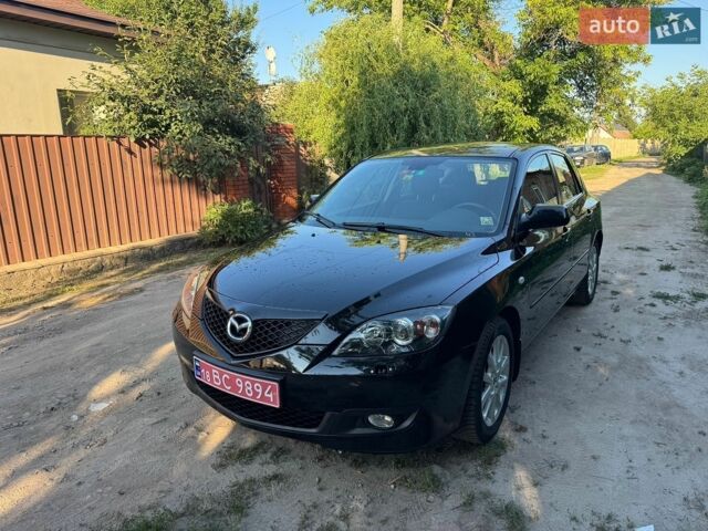 Чорний Мазда 3, об'ємом двигуна 1.6 л та пробігом 194 тис. км за 7350 $, фото 1 на Automoto.ua
