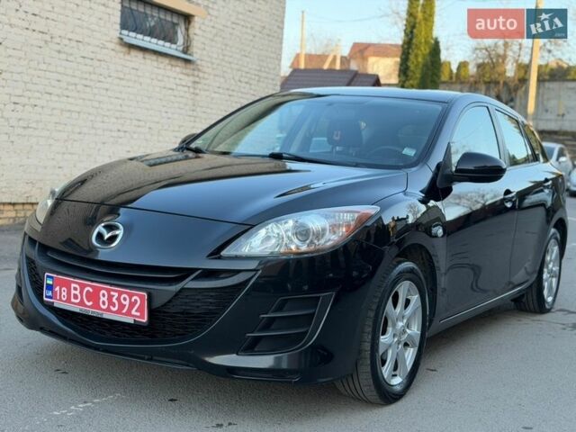 Черный Мазда 3, объемом двигателя 1.6 л и пробегом 185 тыс. км за 6499 $, фото 1 на Automoto.ua
