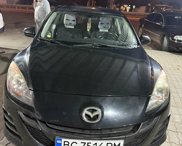 Черный Мазда 3, объемом двигателя 1.56 л и пробегом 243 тыс. км за 6300 $, фото 1 на Automoto.ua