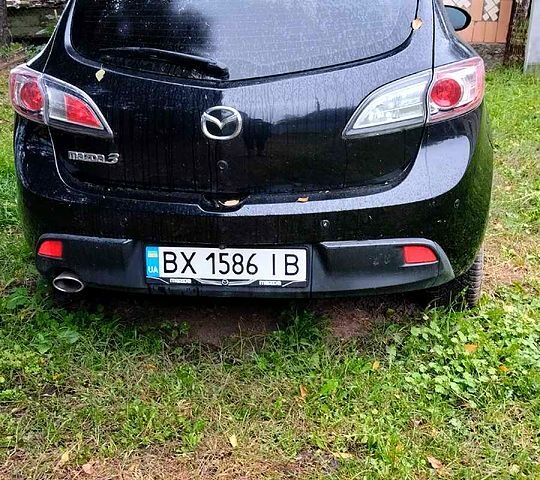Черный Мазда 3, объемом двигателя 1.6 л и пробегом 180 тыс. км за 7000 $, фото 1 на Automoto.ua
