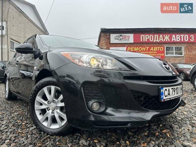 Черный Мазда 3, объемом двигателя 1.6 л и пробегом 296 тыс. км за 6500 $, фото 1 на Automoto.ua