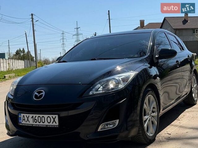 Черный Мазда 3, объемом двигателя 2 л и пробегом 193 тыс. км за 7850 $, фото 1 на Automoto.ua