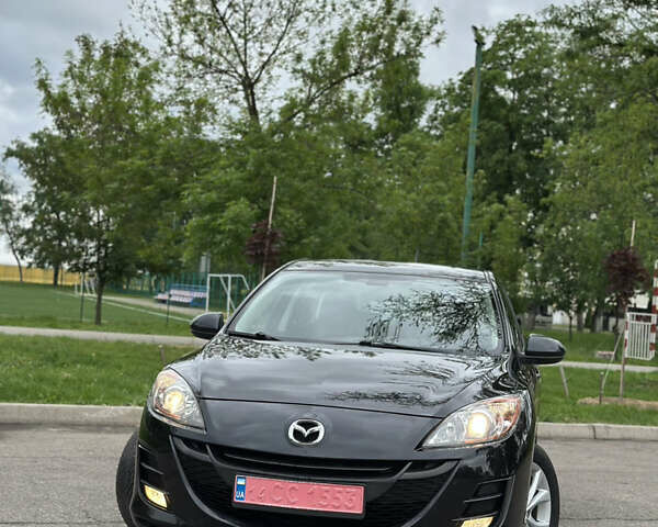 Черный Мазда 3, объемом двигателя 1.6 л и пробегом 213 тыс. км за 7500 $, фото 1 на Automoto.ua